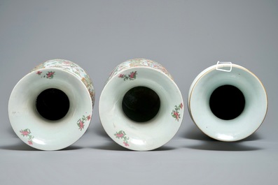 A pair of large Chinese Canton rose medallion vases and a fencai vase with ladies, 19/20th C.